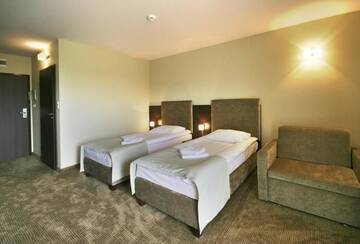 Фото номера Стандартный двухместный номер с 2 отдельными кроватями Отель Hotel Moran &amp; SPA г. Повидз 3